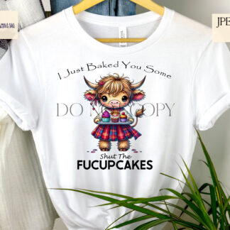 Comedy Highland Cow Cupcake Design Set featuring a male and female Highland cow holding trays of cupcakes with humorous phrases.