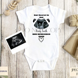 A New Baby Announcement Design Set, featuring space for a baby scan image with editable wording. Comes in Black, Blue, Pink, and Neutral Stone variations. Includes JPEG, PNG, PSD, and a how-to guide.